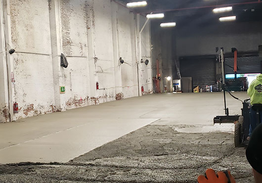 A robotic micro-fulfillment technology company used A.L.M.S. to lay a concrete floor slab for a new facility in Brooklyn.